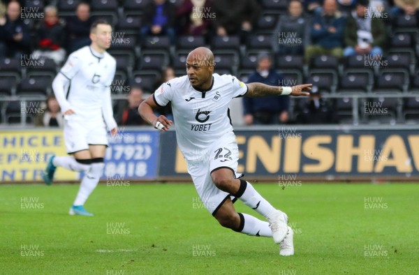 141219 - Swansea City v Middlesbrough, Sky Bet Championship - Andre Ayew of Swansea City wheels away to celebrate after he scores from the penalty spot