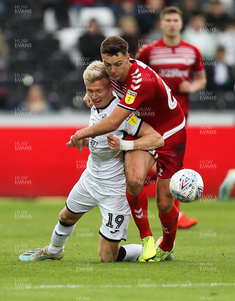 141219 - Swansea City v Middlesbrough, Sky Bet Championship - Sam Surridge of Swansea City is brought down b y Dael Fry of Middlesbrough