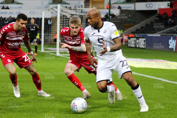 141219 - Swansea City v Middlesbrough, Sky Bet Championship - Andre Ayew of Swansea City takes on Hayden Coulson of Middlesbrough and Marvin Johnson of Middlesbrough