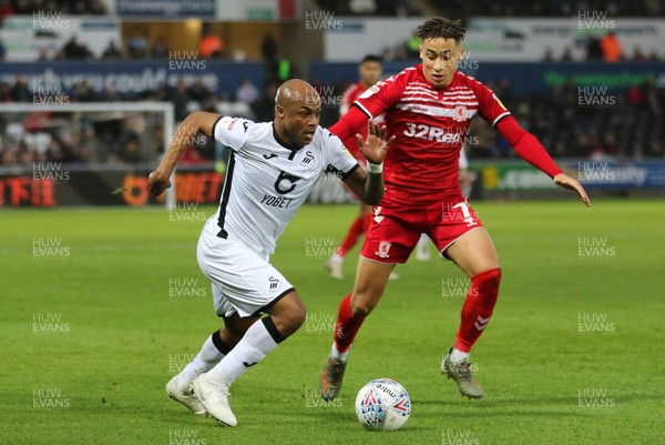 141219 - Swansea City v Middlesbrough, Sky Bet Championship - Andre Ayew of Swansea City takes on Marcus Tavernier of Middlesbrough