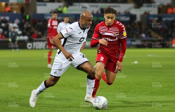141219 - Swansea City v Middlesbrough, Sky Bet Championship - Andre Ayew of Swansea City takes on Marcus Tavernier of Middlesbrough