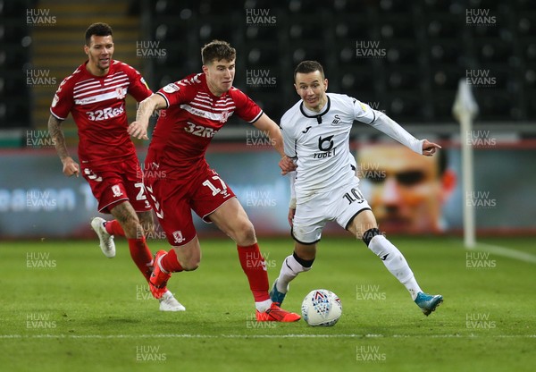 141219 - Swansea City v Middlesbrough, Sky Bet Championship - Bersant Celina of Swansea City holds off Paddy McNair of Middlesbrough