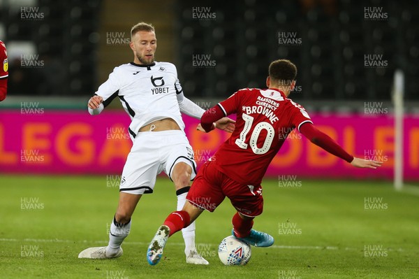141219 - Swansea City v Middlesbrough, Sky Bet Championship - Marcus Browne of Middlesbrough is shown a red card for this tackle on Mike van der Hoorn of Swansea City