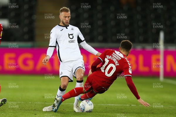 141219 - Swansea City v Middlesbrough, Sky Bet Championship - Marcus Browne of Middlesbrough is shown a red card for this tackle on Mike van der Hoorn of Swansea City