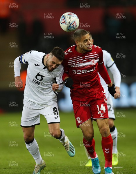 141219 - Swansea City v Middlesbrough, Sky Bet Championship - Rudy Gestede of Middlesbrough and Matt Grimes of Swansea City compete for the ball