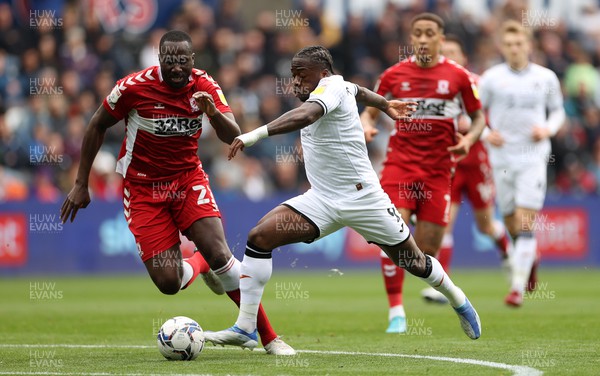 230422 - Swansea City v Middlesbrough - SkyBet Championship - Michael Obafemi of Swansea City is challenged by Souleymane Bamba of Middlesbrough