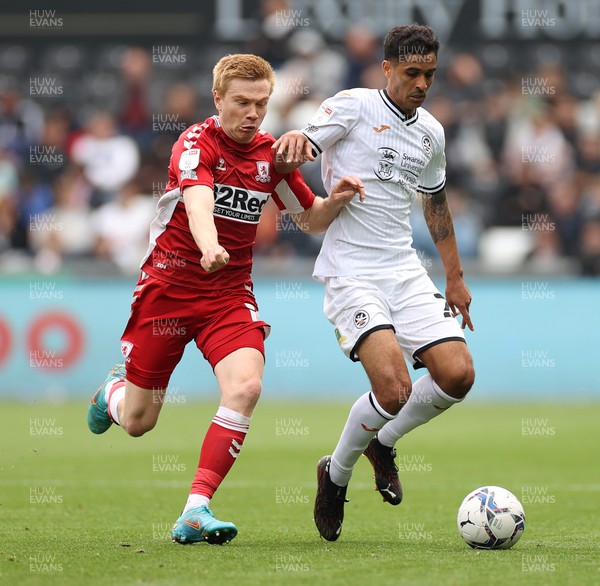 230422 - Swansea City v Middlesbrough - SkyBet Championship - Kyle Naughton of Swansea City is challenged by Duncan Watmore of Middlesbrough