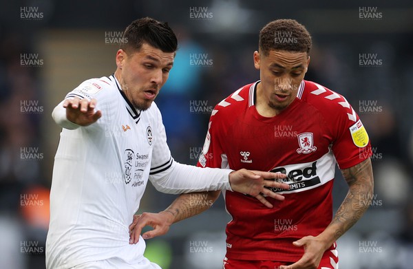 230422 - Swansea City v Middlesbrough - SkyBet Championship - Joel Piroe of Swansea City and Marcus Tavernier of Middlesbrough