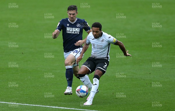 031020 - Swansea City v Millwall - SkyBet Championship - Korey Smith of Swansea City is challenged by Ryan Leonard of Millwall