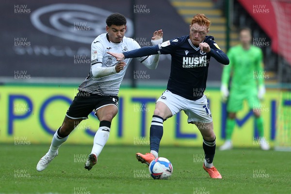 031020 - Swansea City v Millwall - SkyBet Championship - Morgan Gibbs-White of Swansea City is challenged by Ryan Woods of Millwall