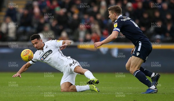 090219 - Swansea City v Millwall - SkyBet Championship - Courtney Baker-Richardson of Swansea City is tackled by Shaun Hutchinson of Millwall
