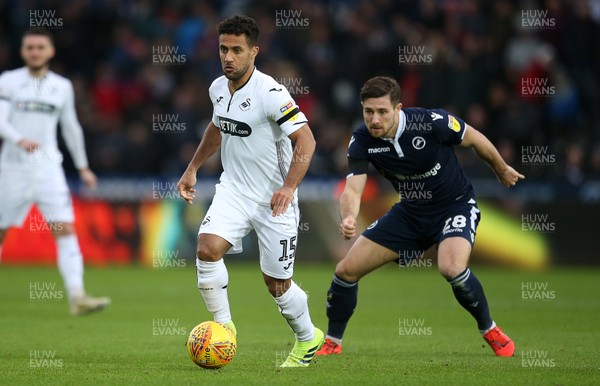 090219 - Swansea City v Millwall - SkyBet Championship - Wayne Routledge of Swansea City is challenged by Ryan Leonard of Millwall
