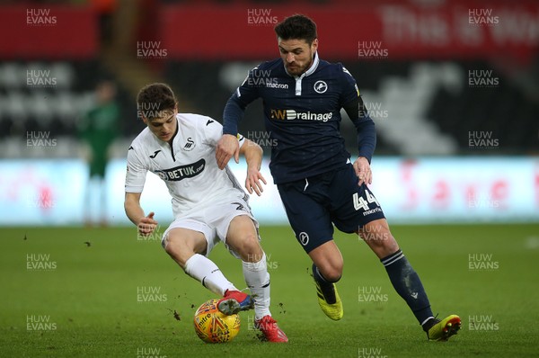 090219 - Swansea City v Millwall - SkyBet Championship - Daniel James of Swansea City is challenged by Ben Marshall of Millwall