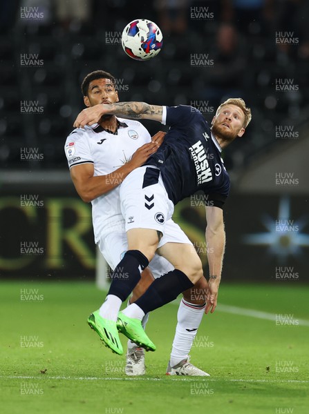 160822 - Swansea City v Millwall, Sky Bet Championship - Andreas Voglsammer of Millwall is put under pressure by Ben Cabango of Swansea City