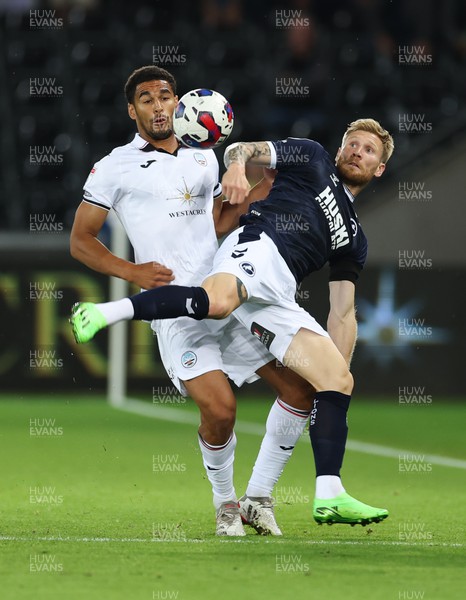 160822 - Swansea City v Millwall, Sky Bet Championship - Andreas Voglsammer of Millwall is put under pressure by Ben Cabango of Swansea City