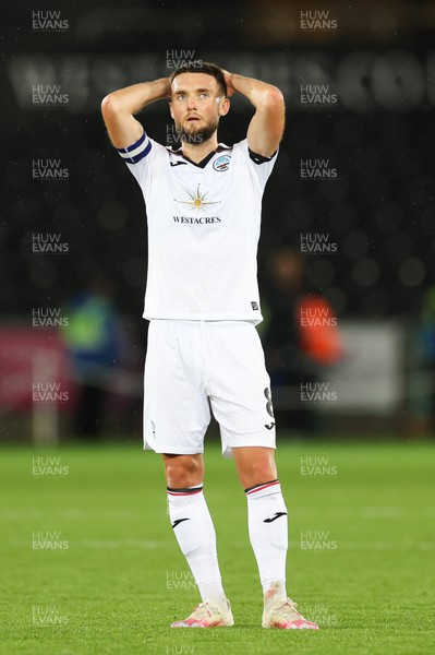 160822 - Swansea City v Millwall, Sky Bet Championship - Matt Grimes of Swansea City looks up at the big screen at the end of the match