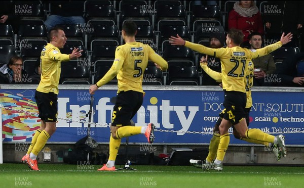 231119 - Swansea City v Millwall - SkyBet Championship - Jed Wallace of Millwall celebrates scoring a goal with team mates