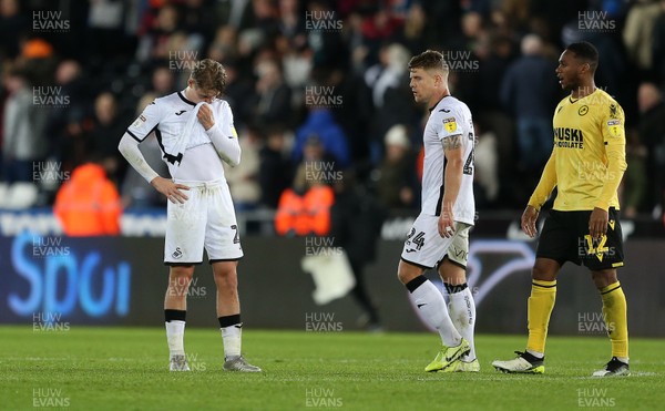 231119 - Swansea City v Millwall - SkyBet Championship - Dejected George Byers and Jake Bidwell of Swansea City