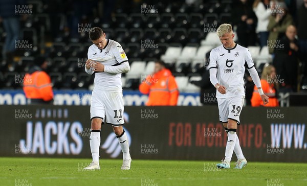 231119 - Swansea City v Millwall - SkyBet Championship - Dejected Kristoffer Peterson and Sam Surridge of Swansea City