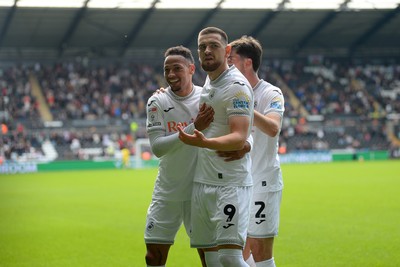 270925 - Swansea City v Millwall - Sky Bet Championship - Zan Vipotnik of Swansea City celebrates with team mates after he scores the first goal of the game