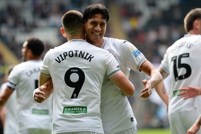 270925 - Swansea City v Millwall - Sky Bet Championship - Marko Stamenic of Swansea City celebrates with Zan Vipotnik after he scores the first goal of the game