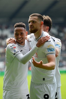 270925 - Swansea City v Millwall - Sky Bet Championship - Zan Vipotnik of Swansea City celebrates with team mates after he scores the first goal of the game