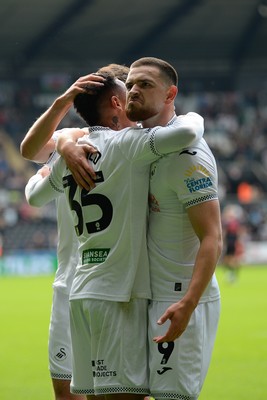 270925 - Swansea City v Millwall - Sky Bet Championship - Zan Vipotnik of Swansea City celebrates with team mates after he scores the first goal of the game