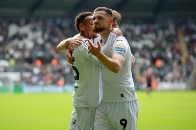 270925 - Swansea City v Millwall - Sky Bet Championship - Zan Vipotnik of Swansea City celebrates with team mates after he scores the first goal of the game