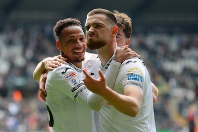 270925 - Swansea City v Millwall - Sky Bet Championship - Zan Vipotnik of Swansea City celebrates with team mates after he scores the first goal of the game