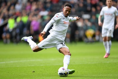 270925 - Swansea City v Millwall - Sky Bet Championship - Ronald of Swansea City has a shot that Zan Vipotnik of Swansea City taps in to score the first goal of the game