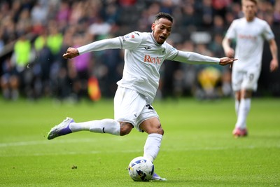 270925 - Swansea City v Millwall - Sky Bet Championship - Ronald of Swansea City has a shot that Zan Vipotnik of Swansea City taps in to score the first goal of the game