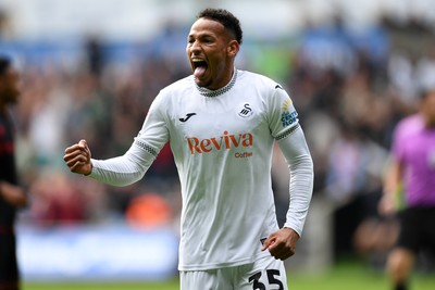 270925 - Swansea City v Millwall - Sky Bet Championship - Ronald of Swansea City celebrates assisting Zan Vipotnik of Swansea City after he scores the first goal of the game