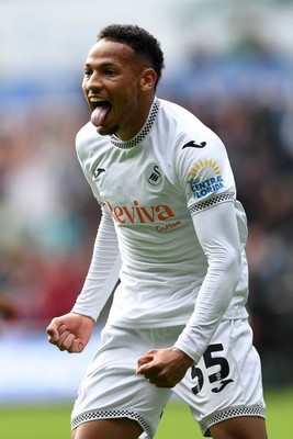270925 - Swansea City v Millwall - Sky Bet Championship - Ronald of Swansea City celebrates assisting Zan Vipotnik of Swansea City after he scores the first goal of the game