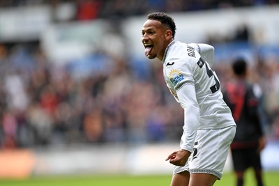 270925 - Swansea City v Millwall - Sky Bet Championship - Ronald of Swansea City celebrates assisting Zan Vipotnik of Swansea City after he scores the first goal of the game