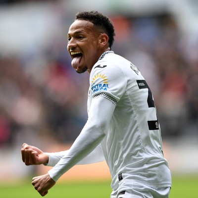 270925 - Swansea City v Millwall - Sky Bet Championship - Ronald of Swansea City celebrates assisting Zan Vipotnik of Swansea City after he scores the first goal of the game