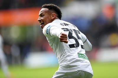 270925 - Swansea City v Millwall - Sky Bet Championship - Ronald of Swansea City celebrates assisting Zan Vipotnik of Swansea City after he scores the first goal of the game