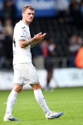 270925 - Swansea City v Millwall - Sky Bet Championship - Josh Tymon of Swansea City applauding fans at full time