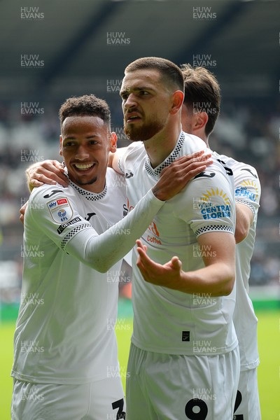 270925 - Swansea City v Millwall - Sky Bet Championship - Zan Vipotnik of Swansea City celebrates with team mates after he scores the first goal of the game