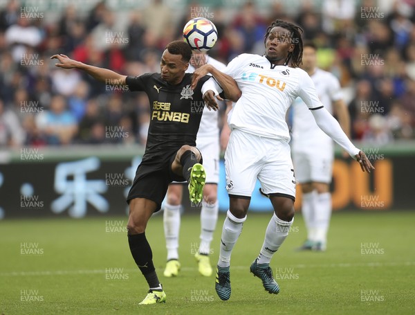 100917 - Swansea City v Newcastle United, Premier League - Renato Sanches of Swansea City and Jacob Murphy of Newcastle United compete for the ball