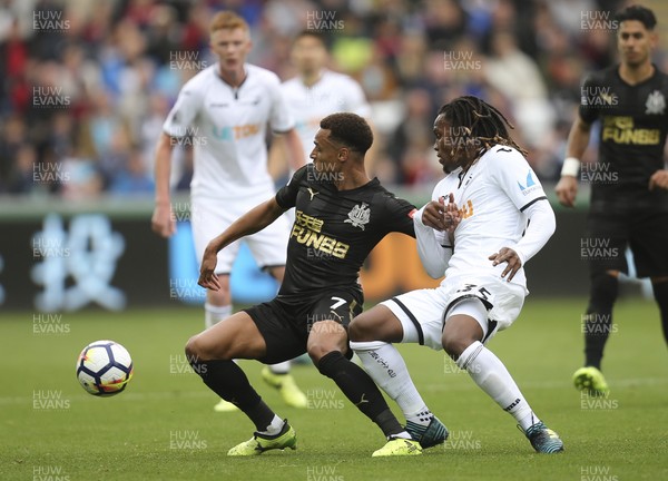 100917 - Swansea City v Newcastle United, Premier League - Renato Sanches of Swansea City and Jacob Murphy of Newcastle United compete for the ball