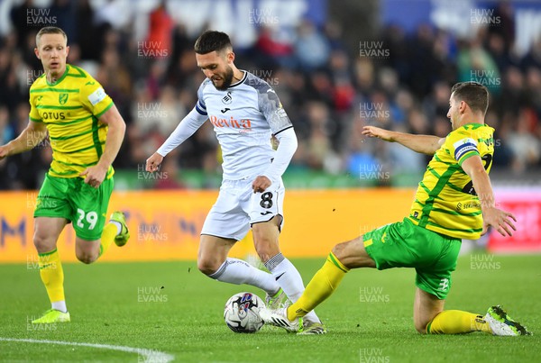 041023 - Swansea City v Norwich City - EFL SkyBet Championship - Matt Grimes of Swansea City is tackled by Kenny McLean of Norwich City