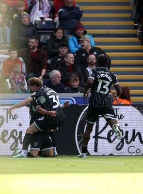 101026 - Swansea City v Norwich City - SkyBet Championship - Jacob Wright of Norwich scores a goal with team mates
