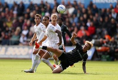 101026 - Swansea City v Norwich City - SkyBet Championship - Adam Idah of Swansea is tackled by Pelle Mattsson of Norwich 