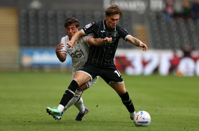 101026 - Swansea City v Norwich City - SkyBet Championship - Goncalo Franco of Swansea is tackled by Jacob Wright of Norwich 