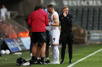 101026 - Swansea City v Norwich City - SkyBet Championship - Zan Vipotnik of Swansea is treated for a blood injury