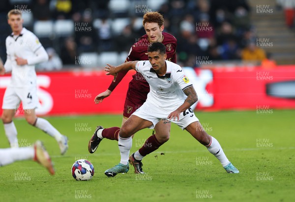 101222 - Swansea City v Norwich City, Sky Bet Championship - Kyle Naughton of Swansea City is challenged by Josh Sargent of Norwich City