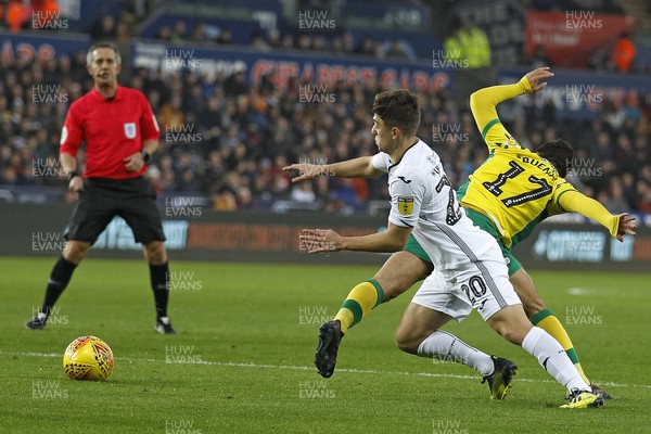241118 - Swansea City v Norwich City, EFL Championship - Daniel James of Swansea City (left) in action with Emi Buendia of Norwich City