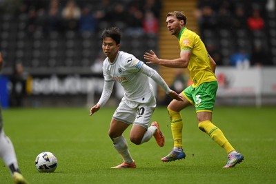 251025 - Swansea City v Norwich City - Sky Bet Championship - Eom Ji-Sung of Swansea City is challenged by Jack Stacey of Norwich