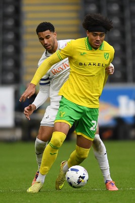 251025 - Swansea City v Norwich City - Sky Bet Championship - Ben Cabango of Swansea City is challenged by Jovon Makama of Norwich