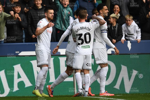 251025 - Swansea City v Norwich City - Sky Bet Championship - Zan Vipotnik of Swansea City celebrates scoring a goal with team mates